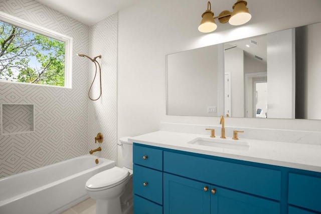 517 Tillery St Unit 3, Austin, TX 78702 - full bath with vanity, toilet, washtub / shower combination, and wallpapered walls