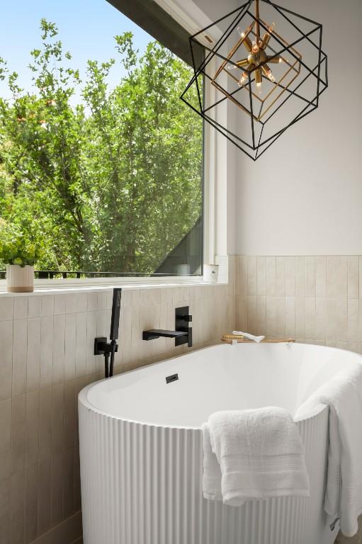 517 Tillery St Unit 3, Austin, TX 78702 - full bath with a freestanding tub