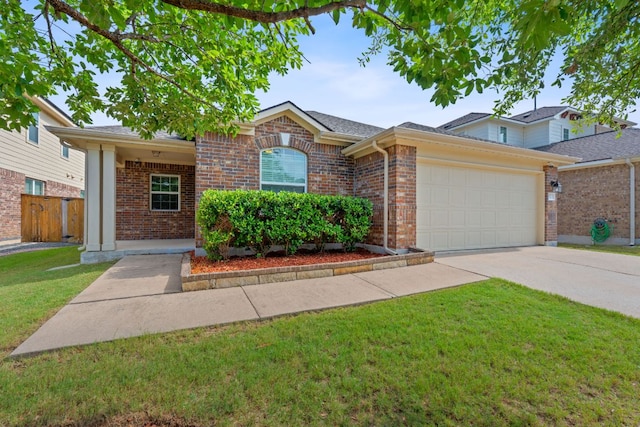 3712 Brean Down Rd, Pflugerville, TX 78660 - ranch-style house with an attached garage, brick siding, and driveway