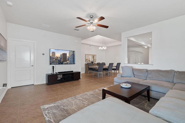 3712 Brean Down Rd, Pflugerville, TX 78660 - tiled living area with ceiling fan, a chandelier, and baseboards