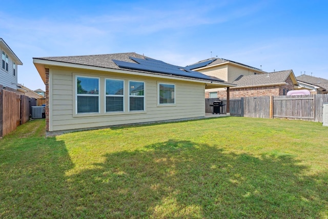 3712 Brean Down Rd, Pflugerville, TX 78660 - back of property with central AC and roof mounted solar panels