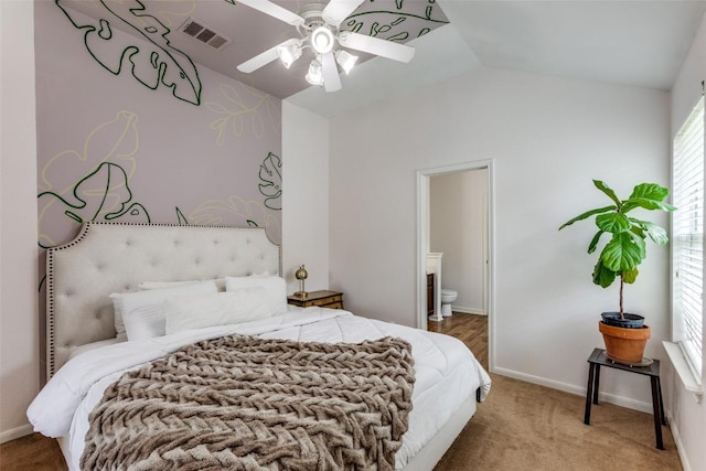 205 Tolcarne Dr, Hutto, TX 78634 - bedroom featuring lofted ceiling, ensuite bath, carpet, a ceiling fan, and baseboards