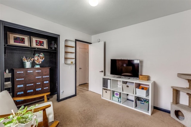 205 Tolcarne Dr, Hutto, TX 78634 - sitting room featuring carpet flooring and baseboards