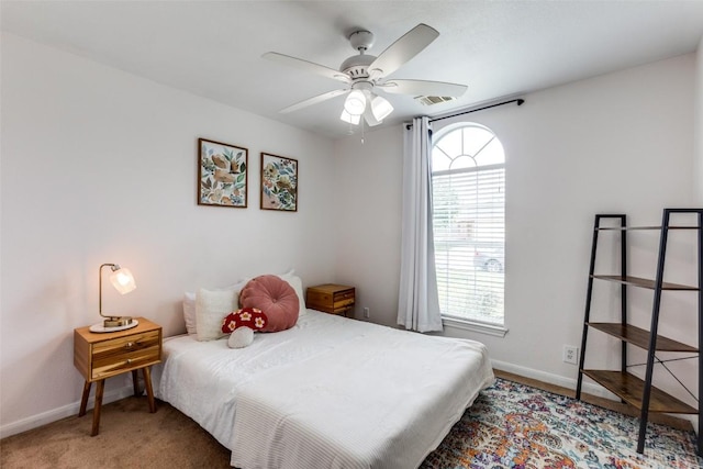 205 Tolcarne Dr, Hutto, TX 78634 - bedroom featuring baseboards and carpet