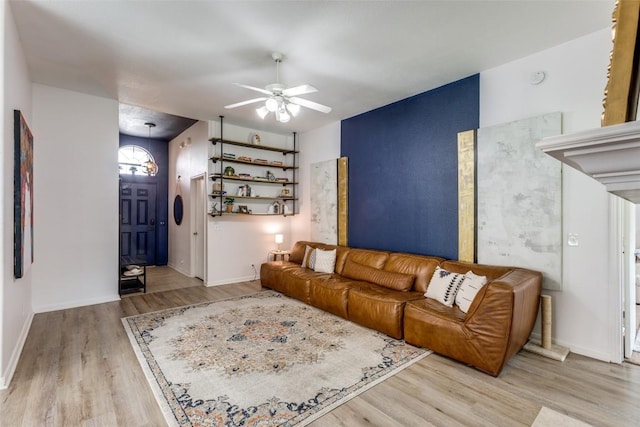 205 Tolcarne Dr, Hutto, TX 78634 - living room with wood finished floors and a ceiling fan
