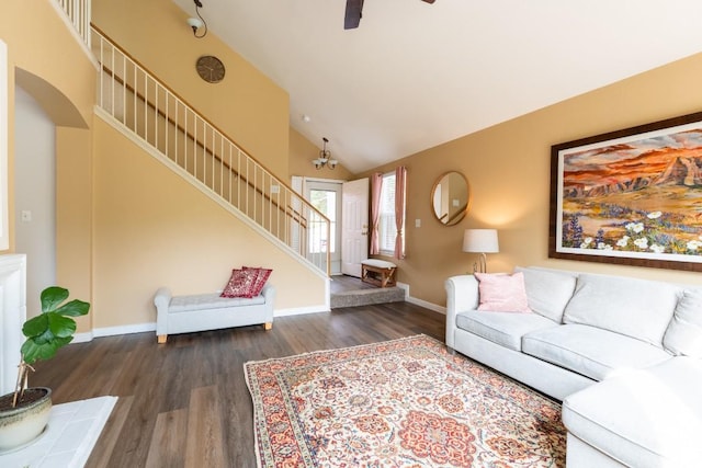 1818 W Pflugerville Pkwy, Round Rock, TX 78664 - living room featuring stairs, arched walkways, wood finished floors, a ceiling fan, and high vaulted ceiling