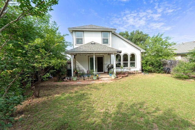 1818 W Pflugerville Pkwy, Round Rock, TX 78664 - back of house featuring stucco siding, roof with shingles, and a porch