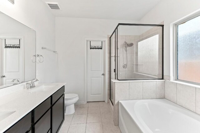 6010 Principale Dr, Pflugerville, TX 78660 - bathroom with plenty of natural light, a bath, a shower stall, and double vanity