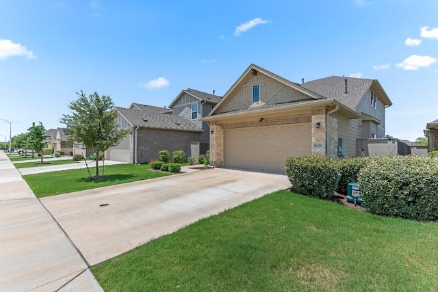 6010 Principale Dr, Pflugerville, TX 78660 - view of front of house featuring stone siding, an attached garage, concrete driveway, a front yard, and a shingled roof