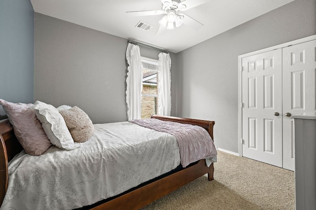 1518 Foppiano Loop, Round Rock, TX 78665 - bedroom with carpet, a closet, a ceiling fan, and baseboards