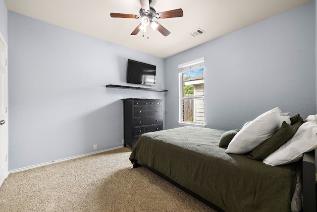 1518 Foppiano Loop, Round Rock, TX 78665 - bedroom featuring carpet flooring, baseboards, and a ceiling fan