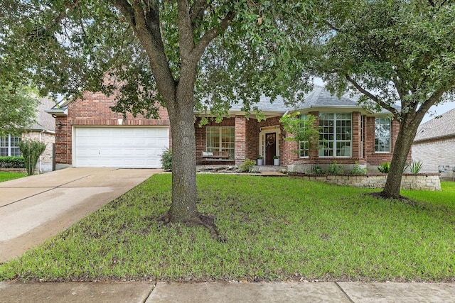 1518 Foppiano Loop, Round Rock, TX 78665 - view of front of property featuring a garage, driveway, brick siding, and a front yard