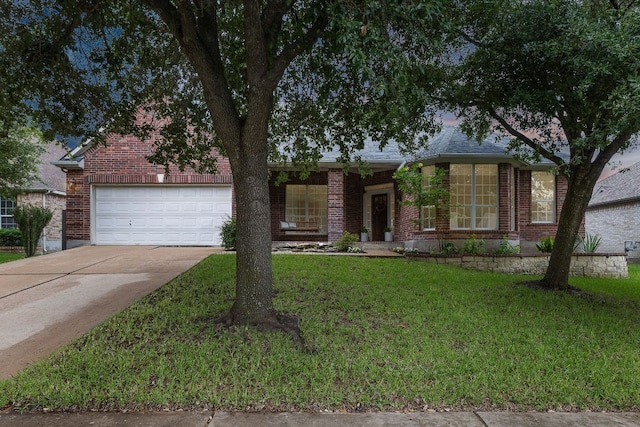 1518 Foppiano Loop, Round Rock, TX 78665 - view of front of house with brick siding, concrete driveway, a front lawn, and a garage