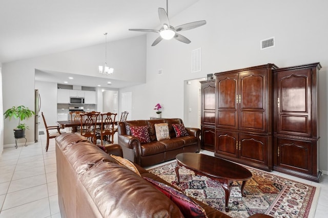 2211 Bettylou Ln, Austin, TX 78754 - living room with a ceiling fan, high vaulted ceiling, a chandelier, and light tile patterned floors