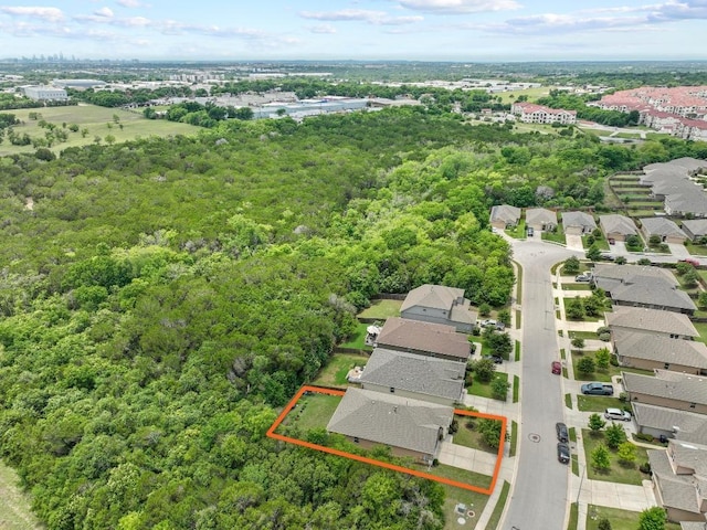 2211 Bettylou Ln, Austin, TX 78754 - aerial perspective of suburban area with property boundaries highlighted and a forest
