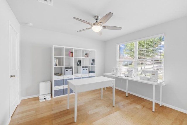 2211 Bettylou Ln, Austin, TX 78754 - office space with ceiling fan, light wood-type flooring, and baseboards