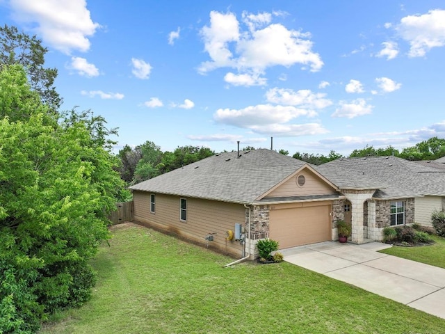 2211 Bettylou Ln, Austin, TX 78754 - view of property exterior with a garage, concrete driveway, and roof with shingles