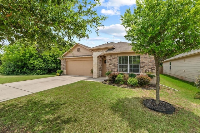 2211 Bettylou Ln, Austin, TX 78754 - view of front of house featuring a garage, driveway, a front lawn, and brick siding