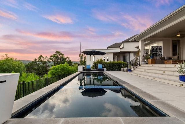 1329 Da Vinci Trl, Leander, TX 78641 - pool at dusk featuring a patio area