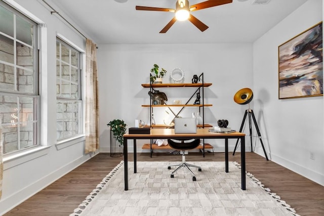 1329 Da Vinci Trl, Leander, TX 78641 - office space with a ceiling fan and wood finished floors