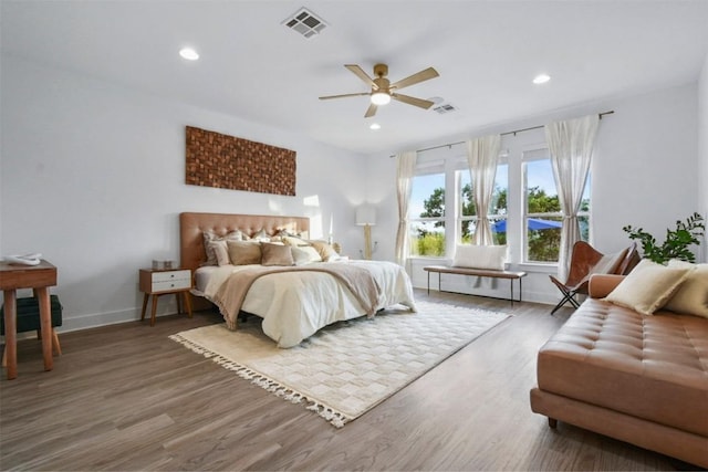 1329 Da Vinci Trl, Leander, TX 78641 - bedroom with wood finished floors, recessed lighting, and a ceiling fan