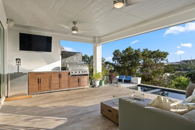 1329 Da Vinci Trl, Leander, TX 78641 - wooden deck featuring area for grilling, outdoor lounge area, and a ceiling fan
