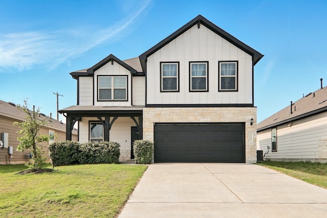 112 Black Alder St, Georgetown, TX 78626 - view of front facade with board and batten siding, a garage, a front yard, driveway, and stone siding