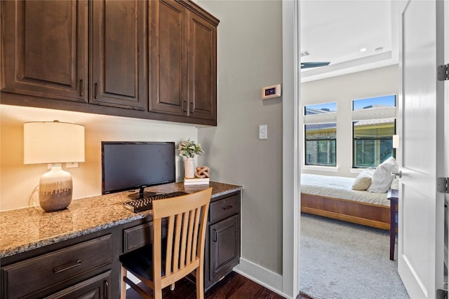 1017 Sue Ann Rose Dr, Austin, TX 78717 - home office with built in desk, baseboards, and a sauna / steam room
