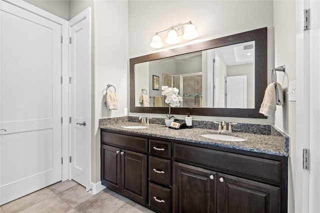 1017 Sue Ann Rose Dr, Austin, TX 78717 - bathroom with double vanity, a shower stall, and tile patterned flooring