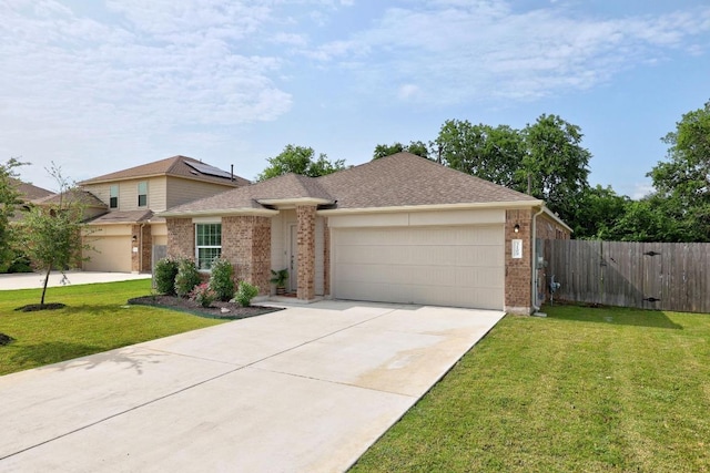 3109 Windy Vane Dr, Pflugerville, TX 78660 - view of front of house featuring brick siding, an attached garage, concrete driveway, and a shingled roof