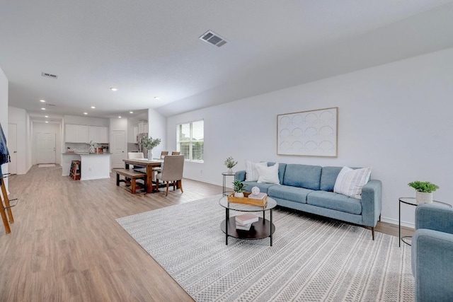 3109 Windy Vane Dr, Pflugerville, TX 78660 - living area featuring light wood-type flooring, baseboards, and recessed lighting