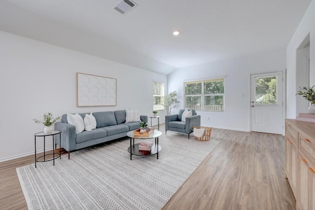 3109 Windy Vane Dr, Pflugerville, TX 78660 - living area with light wood-style floors, healthy amount of natural light, baseboards, vaulted ceiling, and recessed lighting