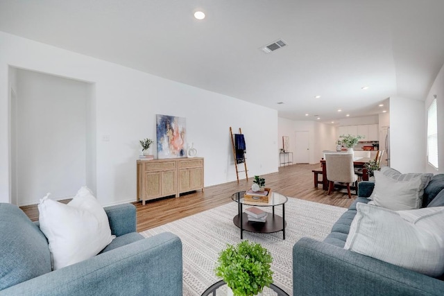 3109 Windy Vane Dr, Pflugerville, TX 78660 - living room featuring light wood-style floors, recessed lighting, and baseboards