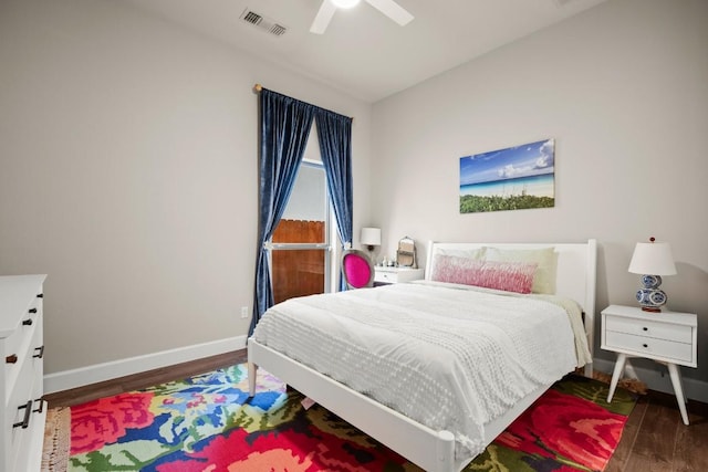 18621 James Power Ct, Austin, TX 78738 - bedroom with wood finished floors, baseboards, and ceiling fan