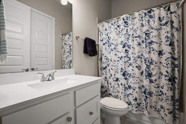 18621 James Power Ct, Austin, TX 78738 - bathroom with vanity, toilet, curtained shower, and tile patterned floors