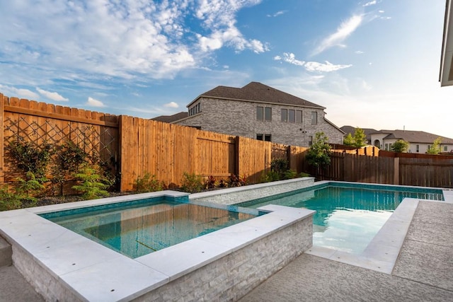 18621 James Power Ct, Austin, TX 78738 - view of swimming pool featuring a fenced backyard and a pool with connected hot tub