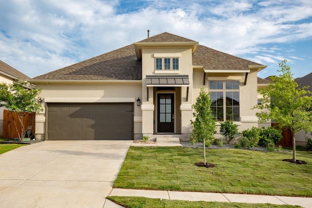 18621 James Power Ct, Austin, TX 78738 - view of front of home with stucco siding, a shingled roof, concrete driveway, and a garage