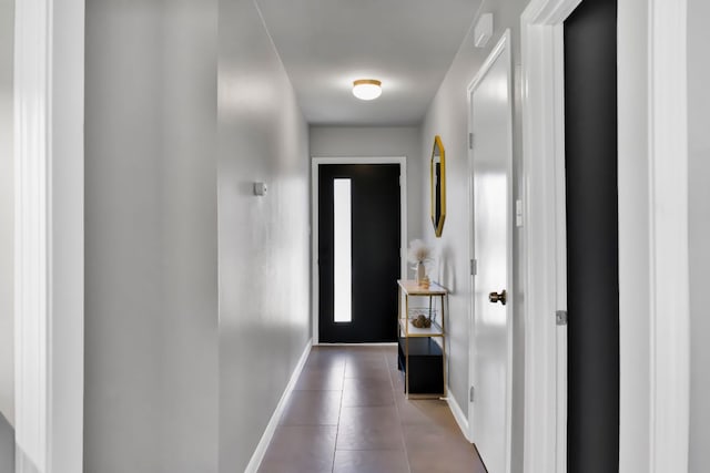 1205 Arthur Stiles Rd, Austin, TX 78721 - entryway with tile patterned floors and baseboards
