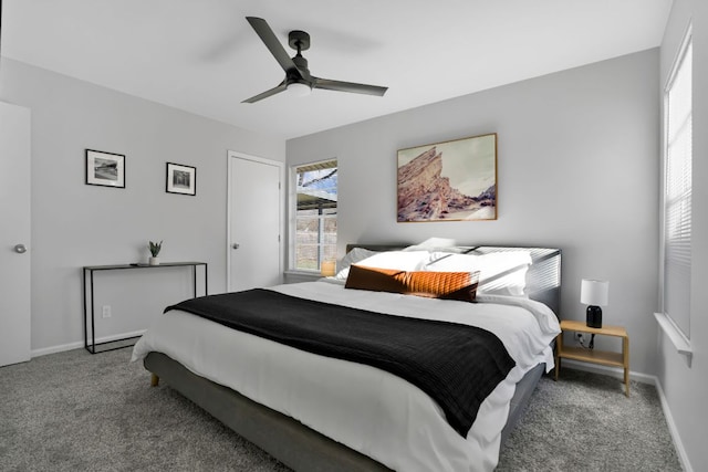 1205 Arthur Stiles Rd, Austin, TX 78721 - carpeted bedroom with baseboards and a ceiling fan