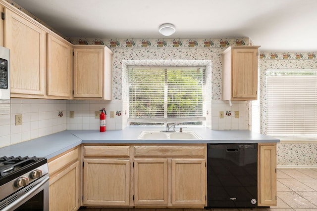 12303 Shropshire Blvd, Austin, TX 78753 - kitchen featuring black dishwasher, light brown cabinetry, a sink, backsplash, and wallpapered walls