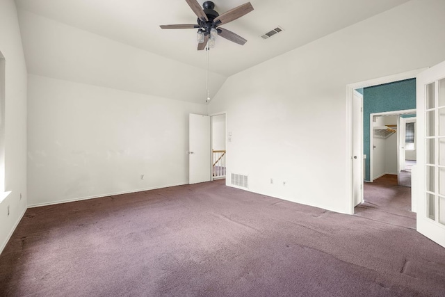 12303 Shropshire Blvd, Austin, TX 78753 - unfurnished bedroom with carpet, vaulted ceiling, baseboards, and a ceiling fan