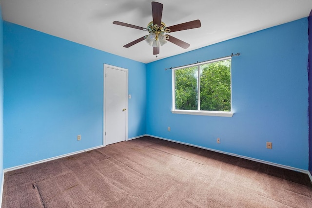 12303 Shropshire Blvd, Austin, TX 78753 - spare room with carpet flooring, ceiling fan, and baseboards
