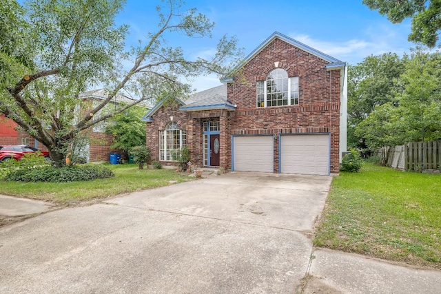 12303 Shropshire Blvd, Austin, TX 78753 - traditional-style house with brick siding, an attached garage, and concrete driveway