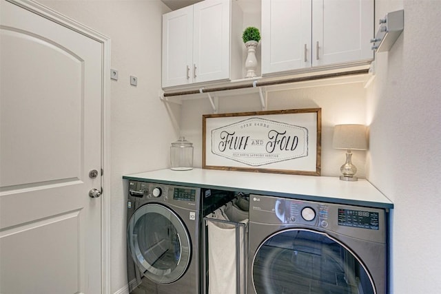 20517 Kangal Ct, Pflugerville, TX 78660 - laundry room featuring washer and clothes dryer and cabinet space