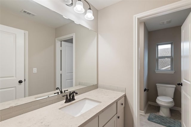 5400 Alonso Dr, Austin, TX 78738 - bathroom with vanity, toilet, and baseboards