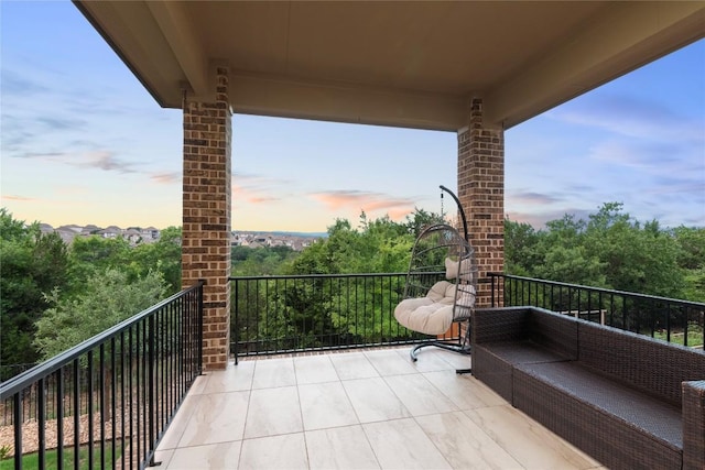 5400 Alonso Dr, Austin, TX 78738 - balcony at dusk featuring an outdoor living space