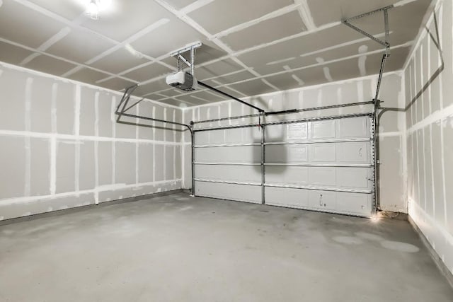 9008 Tall Sky Trce, Austin, TX 78724 - garage featuring a garage door opener