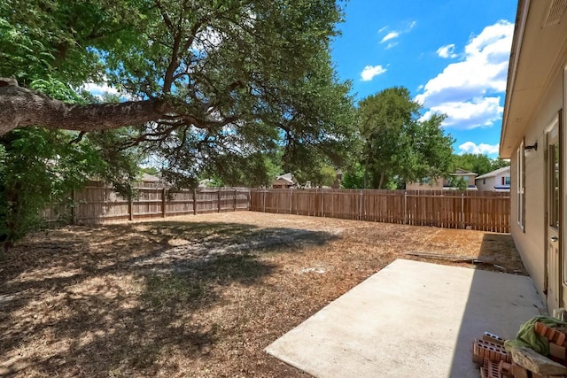 9008 Tall Sky Trce, Austin, TX 78724 - fenced backyard featuring a patio