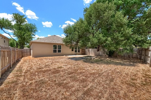 9008 Tall Sky Trce, Austin, TX 78724 - back of property featuring a fenced backyard and a patio area