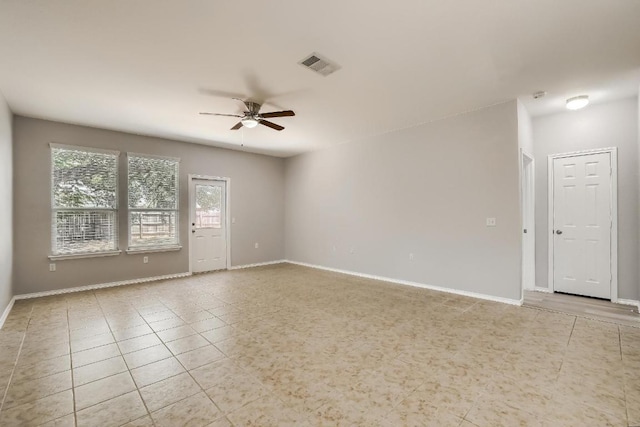 9008 Tall Sky Trce, Austin, TX 78724 - empty room with ceiling fan, tile patterned flooring, and baseboards